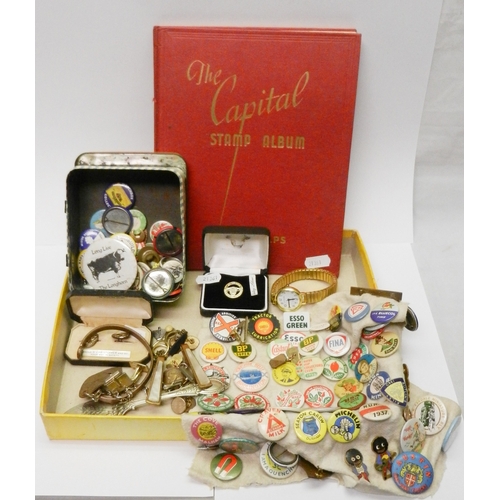 57 - Cufflinks incl white metal examples; various badges; a sparsely filled schoolboy stamp album, most m... 