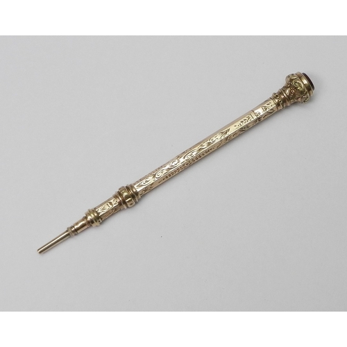 70 - An Edwardian propelling pencil, yellow metal indistinctly marked.  84mm retracted