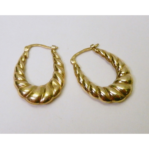 73 - A pair of Italian textured hoop earrings, 9ct gold.  25mm long / 1.5g