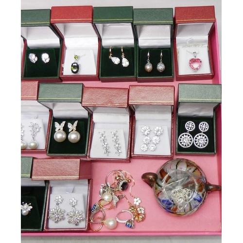 48 - A collection of white metal stone set earrings, pendants, etc all seemingly unused, most boxed.