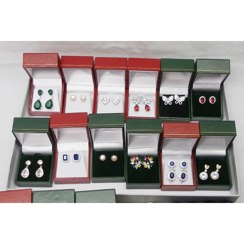 49 - A collection of white metal stone set earrings all seemingly unused together with a cultured pearl n... 