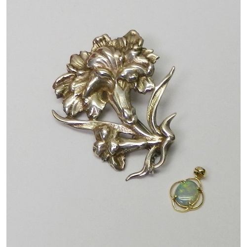 60 - An opal doublet and yellow metal pendant; a carnation 
 flower head motif brooch, white metal; costu... 