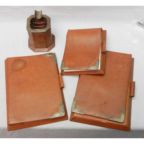 81 - An Asprey London desk set, pigskin covered with silver mounts.  The set comprising a fold cover stat... 