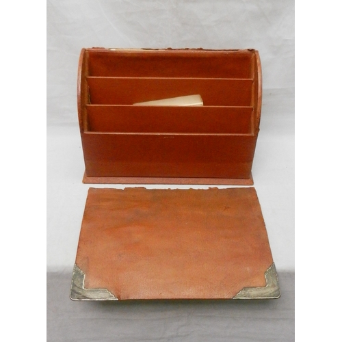 81 - An Asprey London desk set, pigskin covered with silver mounts.  The set comprising a fold cover stat... 