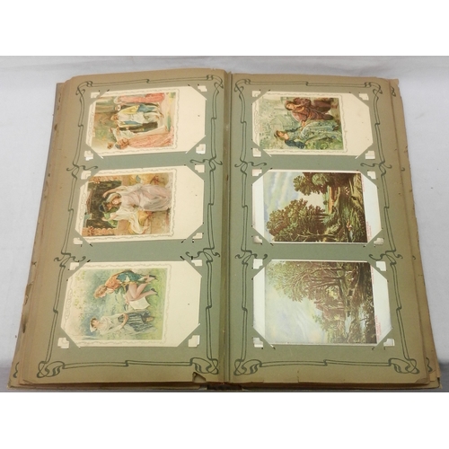 82 - An Edwardian & 1910s album containing a collection of postcards incl World War I, seaside humour, Pe... 