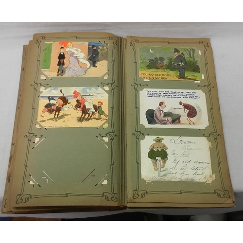 82 - An Edwardian & 1910s album containing a collection of postcards incl World War I, seaside humour, Pe... 