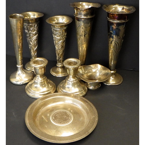 581 - Two pairs of silver spill vases , squat silver candlesticks ALL FILLED BASES together with a silver ... 