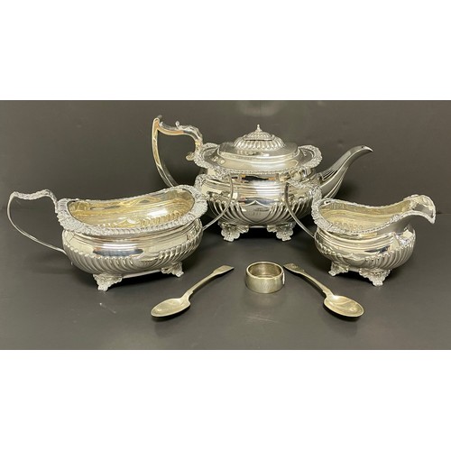 A Silver 3 piece tea set together with two silver spoons and a silver napkin ring 1310g