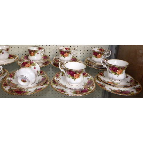 86 - A large group of Royal Albert Country Rose tea / coffee ware (qty)