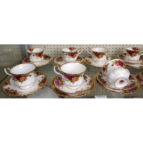 86 - A large group of Royal Albert Country Rose tea / coffee ware (qty)