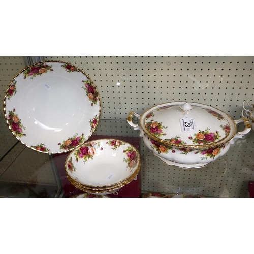 87 - A large group of Royal Albert Country Rose dinner ware (qty)