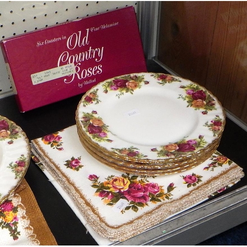 87 - A large group of Royal Albert Country Rose dinner ware (qty)