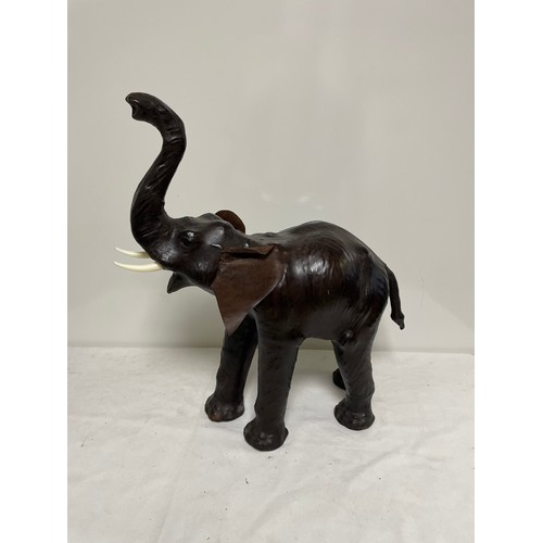 A leather Elephant figure 55cm tall, in the manner of Liberty