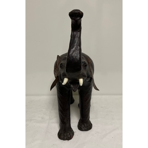 567 - A leather Elephant figure 55cm tall, in the manner of Liberty