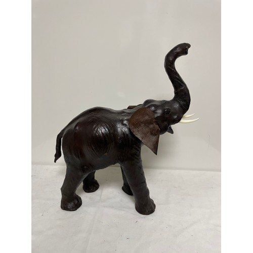 567 - A leather Elephant figure 55cm tall, in the manner of Liberty