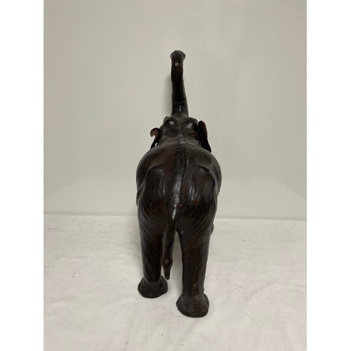 567 - A leather Elephant figure 55cm tall, in the manner of Liberty