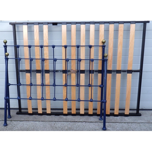 516 - A blue painted Victorian style double bed frame, 138cm wide