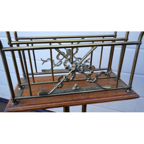 551 - An Edwardian oak & brass newspaper rack, decorated with golf clubs, 80cm tall, stamped Rd 189467, HA... 