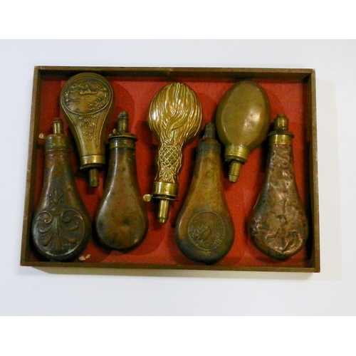 Eight various copper bodied shot / powder flasks, 19th cent.  All A/F