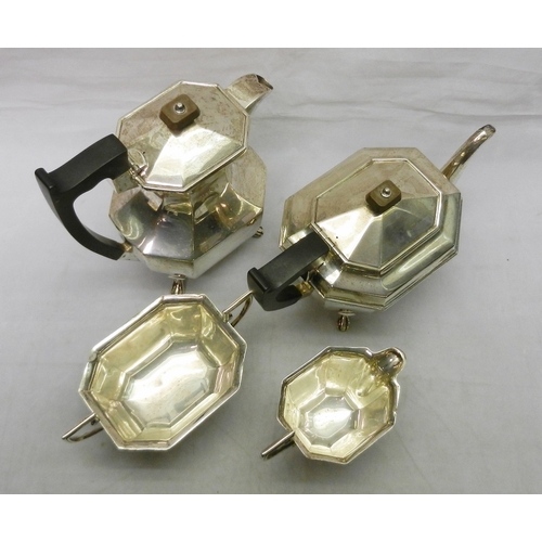  An Art Deco influence four piece silver tea set, Sheffield 1957. 1520g gross / teapot 253mm long.