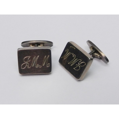 A pair of Georg Jensen silver cufflinks, the rectangular heads engraved with initials and the head backs engraved with a presentation date.  Heads 18 x 13.5mm.