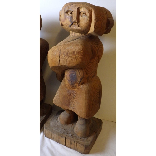 301 - Attributed to Gordon Young, Three large carved wooden figures 60 cm tall. VAT & Buyers Premium apply... 