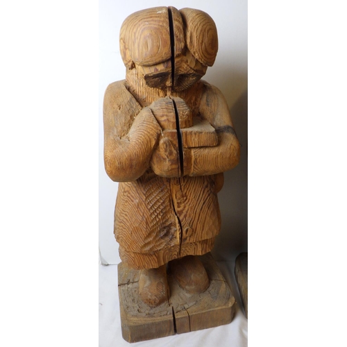 301 - Attributed to Gordon Young, Three large carved wooden figures 60 cm tall. VAT & Buyers Premium apply... 