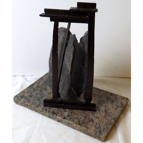 307 - Attributed to Michael Lyons, Odyssey, A marble based slate and steel sculpture 32cm tall. VAT & Buye... 