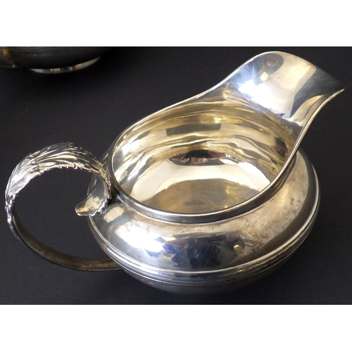 103 - A George IV York silver three piece tea set, comprising teapot, jug and bowl matched dates but same ... 