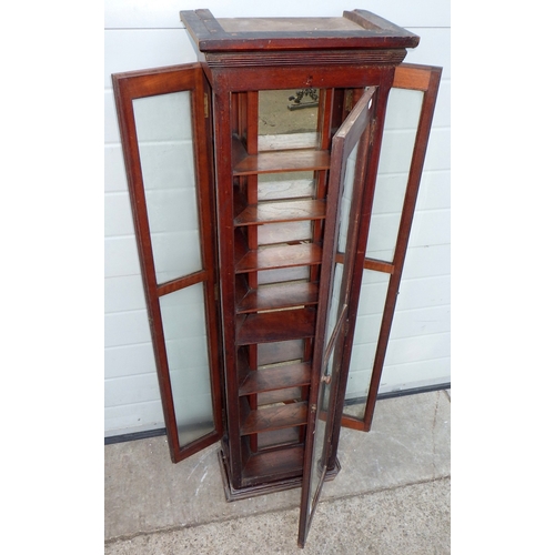A narrow shop display case with door to each side, 39cm wide, 130cm tall, corner cut