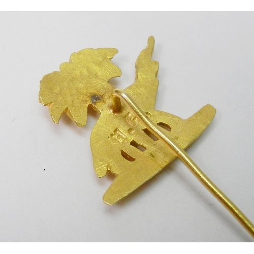 64 - A pair of chain link cufflinks comprising an elephant and palm tree motif head and a plain oval back... 