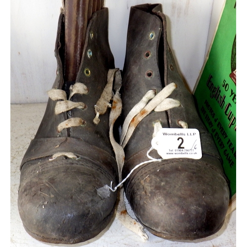 2 - A pair of football boots of 1950s manner; a pair of leather shin pads; two FA cup football interest ... 