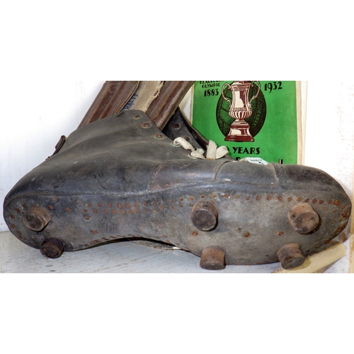 2 - A pair of football boots of 1950s manner; a pair of leather shin pads; two FA cup football interest ... 