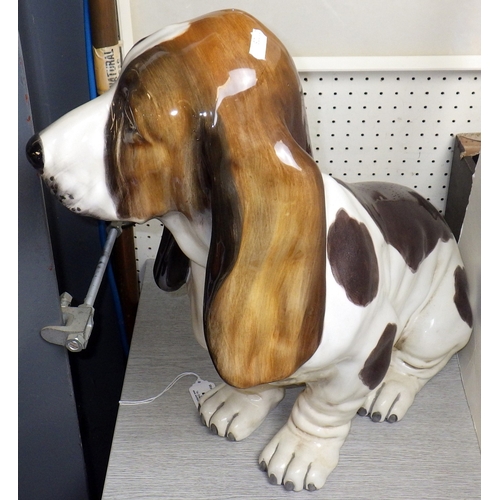 45 - A large ceramic basset hound, 48cm tall