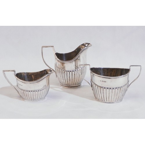 Two similar silver jugs together with a two handled bowl.  Early 20th cent.  Larger jug 103mm tall / 330g total