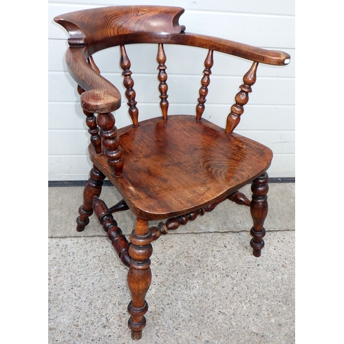 A Victorian smokers bow armchair