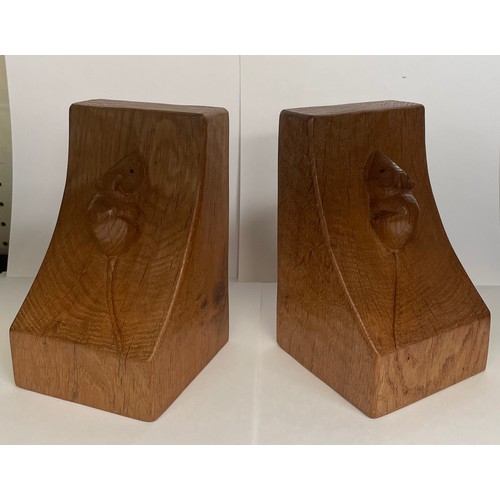 A Pair of Mouseman Oak Single Mouse Bookends, each with carved mouse trademark 15cm high, four pin holes where a presentation plaque has been attached