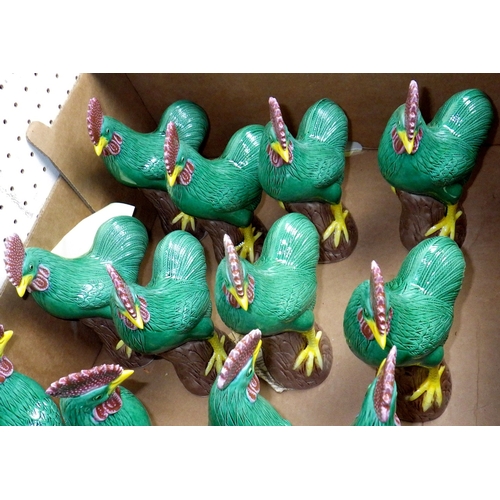 36 - A group of green pottery chickens