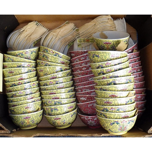 45 - A large qty of red and yellow ground pottery bowls & spoons (4)