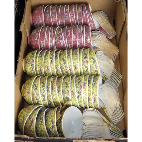 45 - A large qty of red and yellow ground pottery bowls & spoons (4)