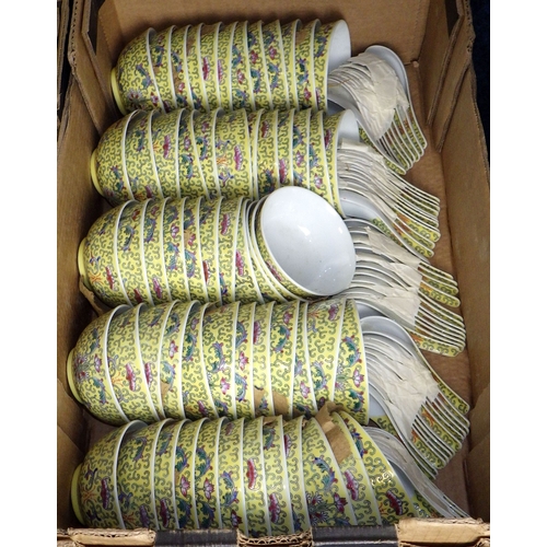 45 - A large qty of red and yellow ground pottery bowls & spoons (4)