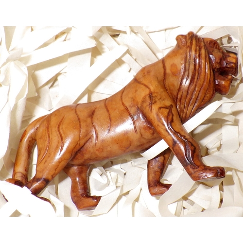 64 - A large qty of miniature carved soapstone big cat figures (5)