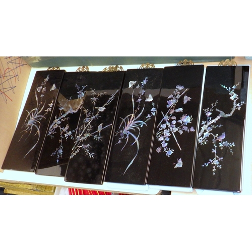 118 - A group of lanterns, lacquered plaques, wicker fans etc (qty)