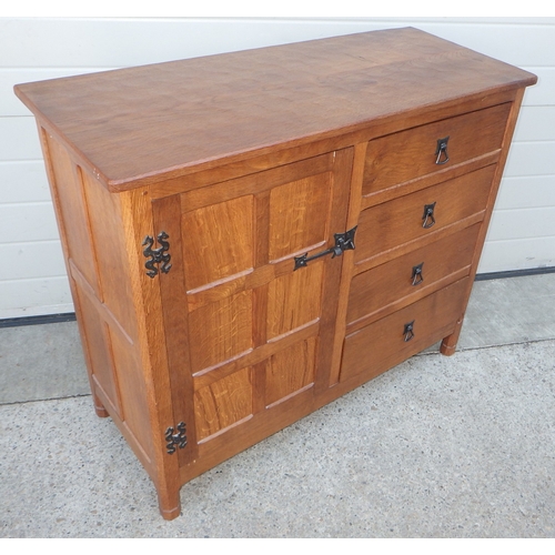 An Alan Grainger, acorn motif, adzed oak side cupboard, 102cm wide
