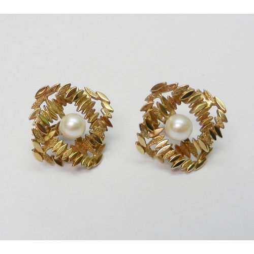 A pair of mid-century statement earrings, yellow metal and pearl.  Possibly bespoke made - bearing indistinct light pin-engraved makers marks verso.  Each 20mm diagonally across