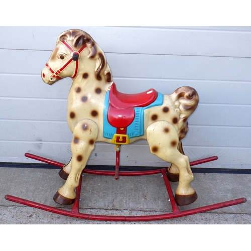A Mobo metal rocking horse