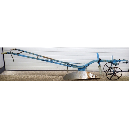 A horse drawn plough