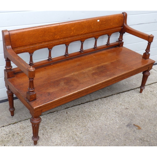 A late Victorian oak bench, back leg a/f, 148cm wide