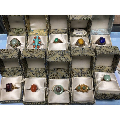 225 - Ten Chinese cocktail rings: variously stone set white metal / gilt white metal. All boxed, unused.