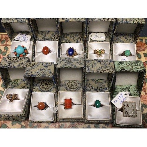229 - Ten Chinese cocktail rings: variously stone set white metal / gilt white metal. All boxed, unused.